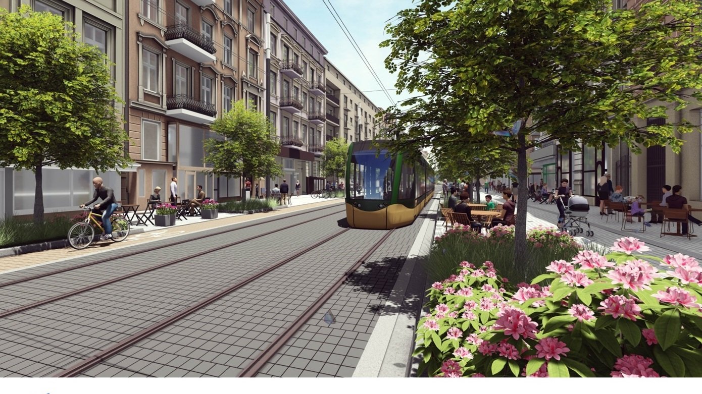 Jest to wizualizacja ulicy Ratajczaka po planowanej przebudowie. Widoczna jest ulica z tramwajem. Po bokach zielone skwery z roślinnością. W tle kamienice. U dołu informacja o pochodzeniu środków finansowych na tę inwestycję.