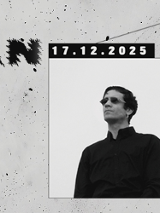 Czarno-białe zdjęcia dwóch mężczyzn w ciemnych ubraniach i okularach. Z lewej strony napisy w języku angieskim oraz informacje o wydarzeniu zawarte w treści artykułu.