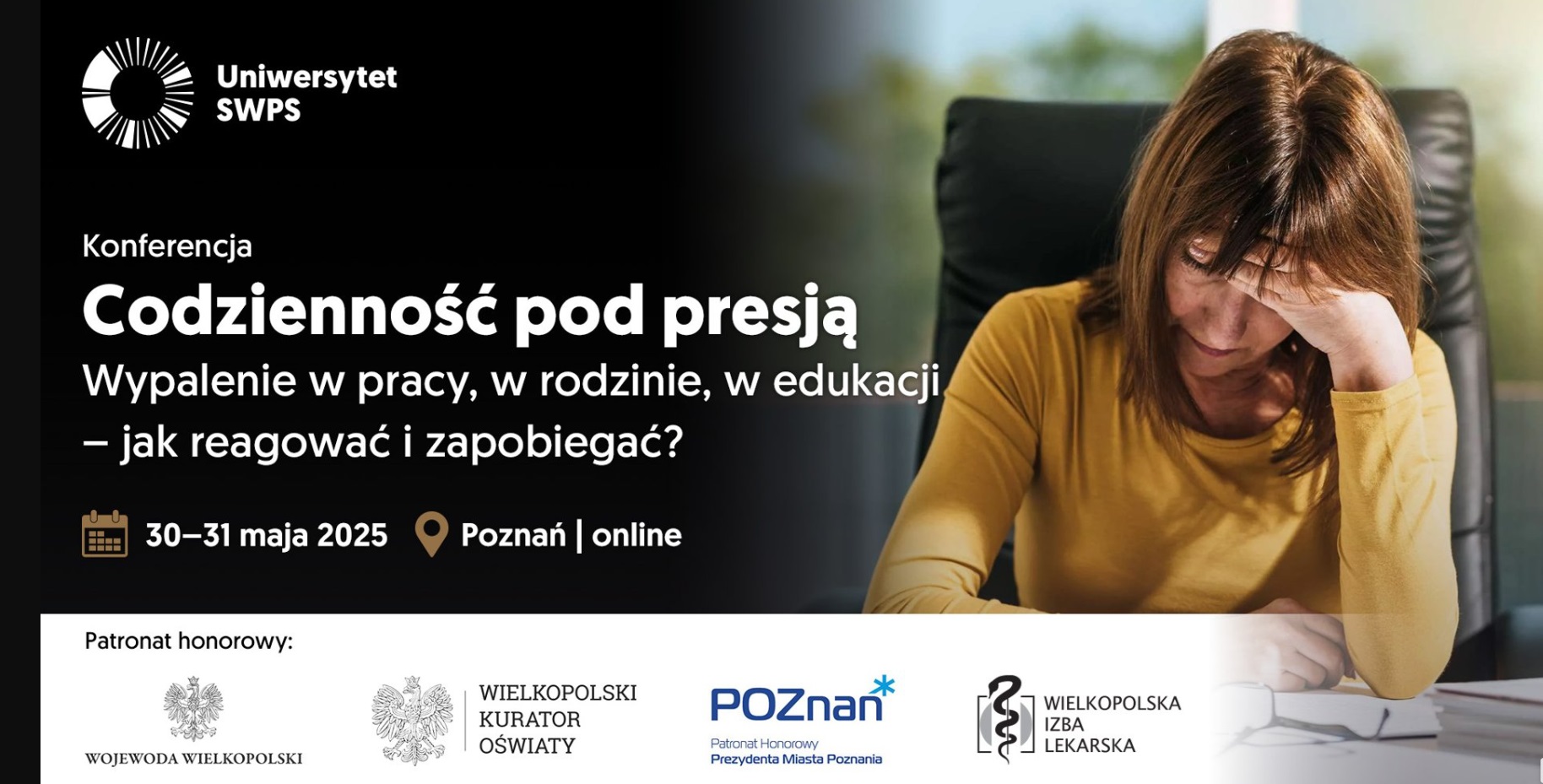 Zdjęcie kobiety siedzącej przy biurki, podpierającej głowę ręką